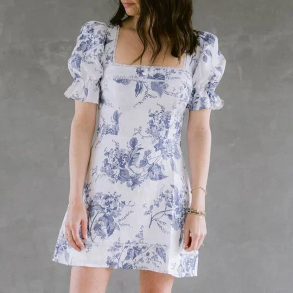 Reformation Evianna mini linen dress in a blue and white lupine pattern